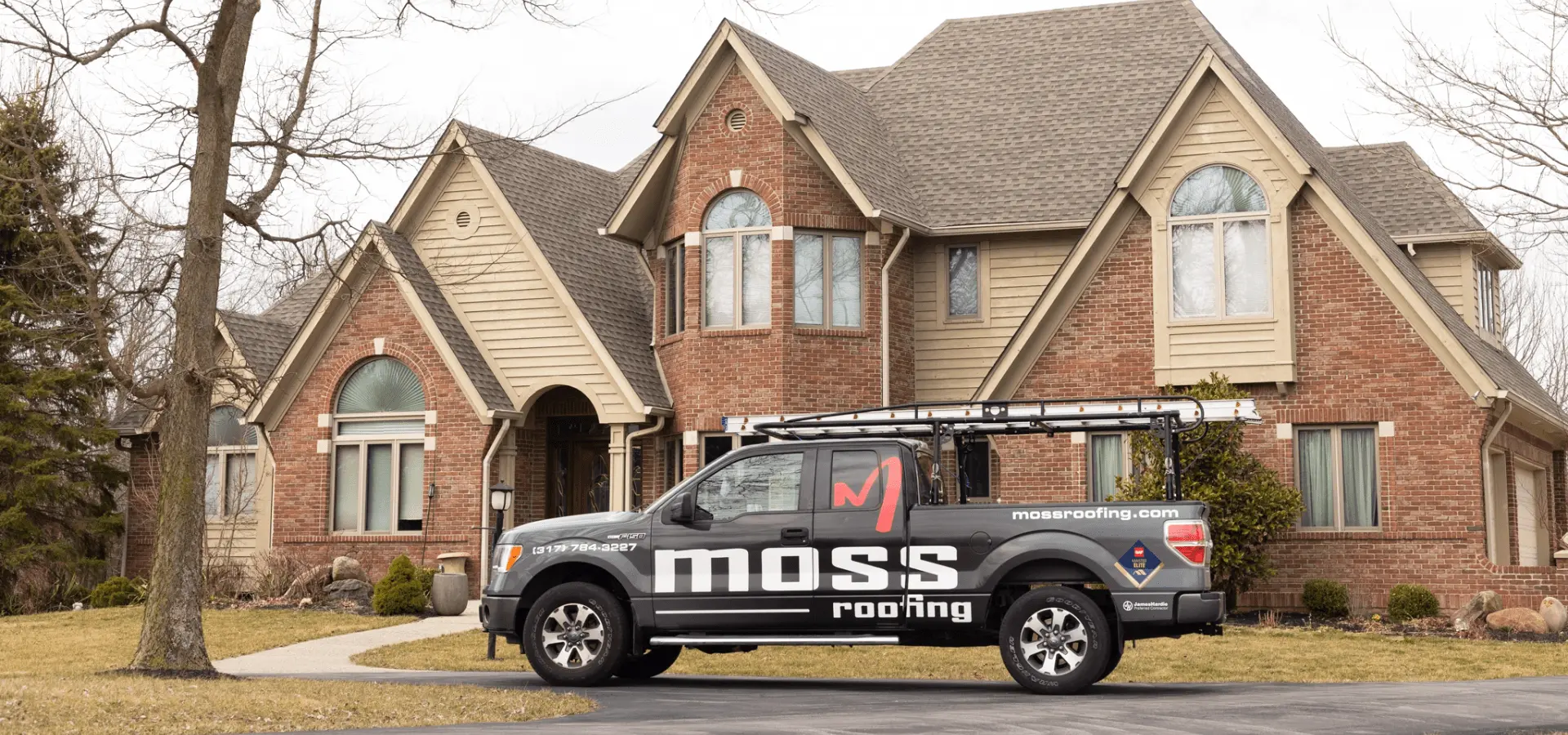 asphalt shingle roof replacement courtesy of Moss Roofing in Greenville