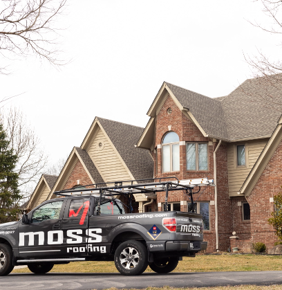 Front view of house in Indianpolis with new siding replacement (grey) courtesy of Moss Roofing.